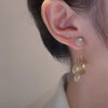 Boucles d'oreilles avec pétales ronds en zircone